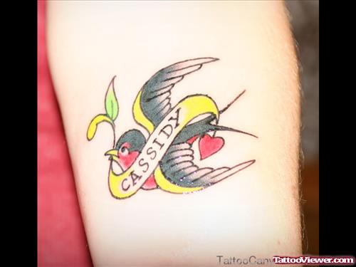 Flying Bird And Banner Women Tattoo
