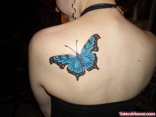 Women With Blue Butterfly Tattoo On Back Shoulder