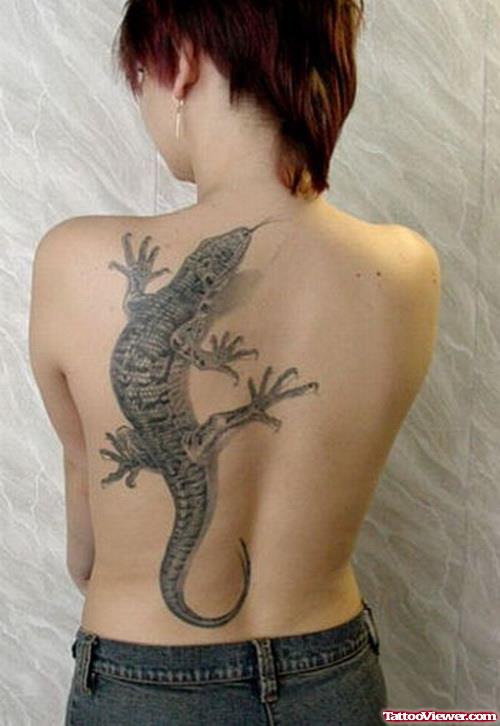 Grey Ink Geicko Lizard Tattoo On Back For Women
