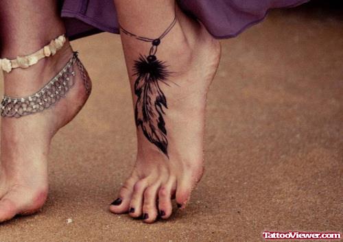 Grey Ink Feather Tattoo On Left Foot Tattoo For Women