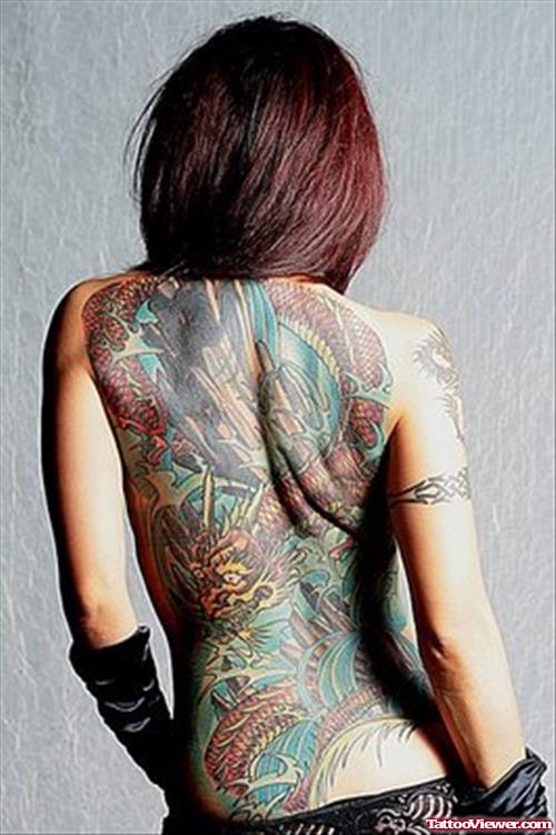Amazing Colored Dragon Tattoo On Back For Women
