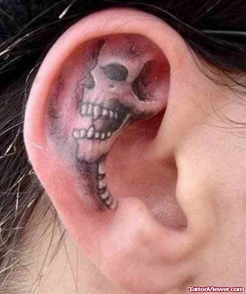 Women Ear Grey Ink Skull Tattoo