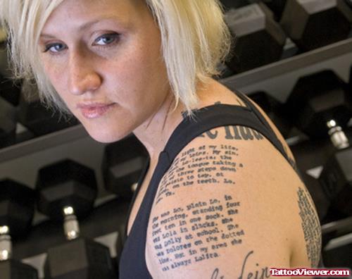 Black Ink Lettering Tattoo On Girl Left Shoulder