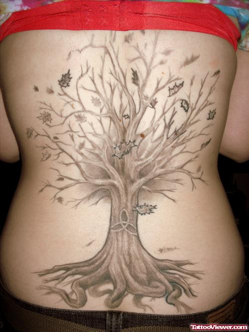 Grey Ink Tree Women Tattoo On Lowerback