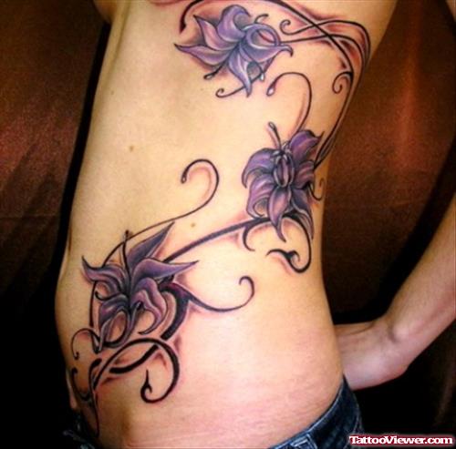 Abdomen Purple Flowers Tattoo For Women
