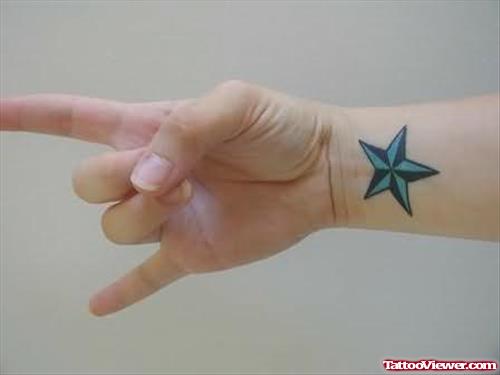 Blue Stars Tattoo On Wrist