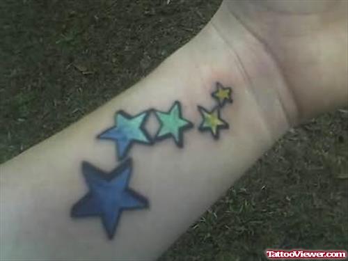 Coloured Stars Tattoo On Wrist