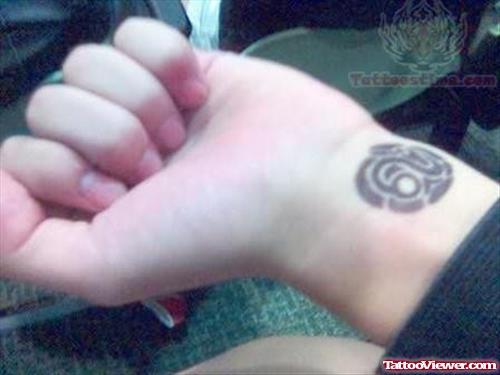 Tattoo of Leo On Wrist