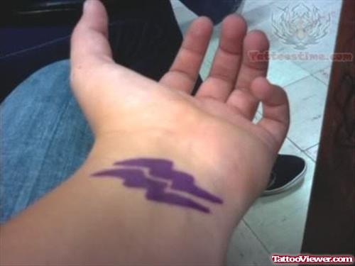 Colorful Aquarius Symbol on Wrist