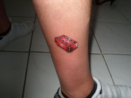 Red Ink 3D Brick Tattoo On Leg