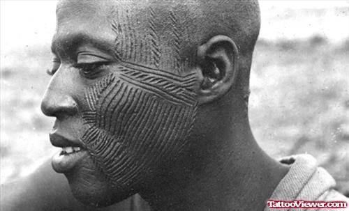 Awesome African Man Face Tattoo