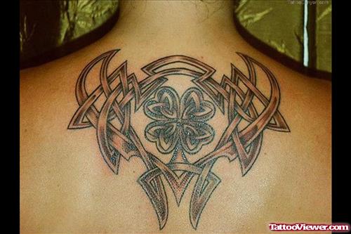 Tribal And Celtic Tattoo On Upperback