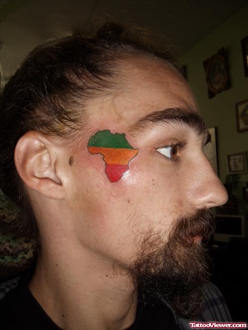 Colorful African Map Tattoo On Man Face