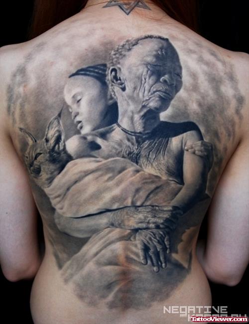 African Woman Holding Cat and Child Tattoo On Back