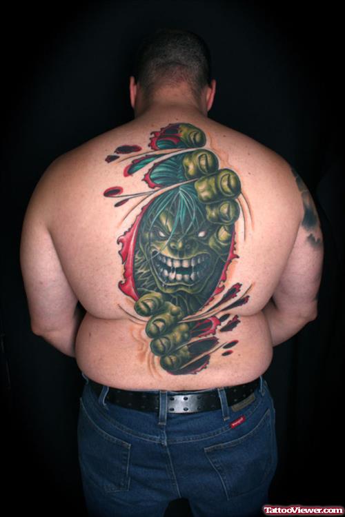 Colored African Ripped Skin Tattoo On Back