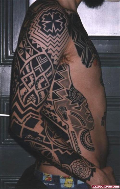 African Tribal Tattoo On Sleeve And Side Rib