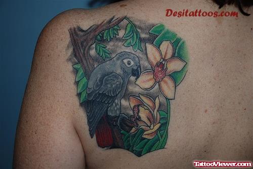 African Parrot And Flowers Tattoo On Back Shoulder
