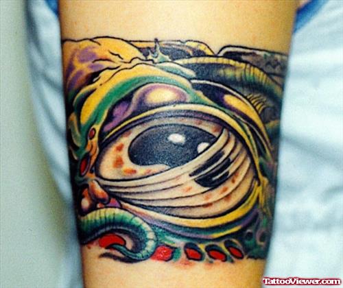 Colored African Biomechanical Eye Tattoo On Bicep