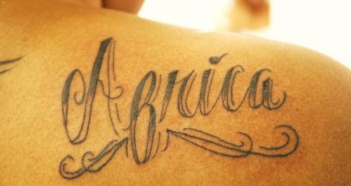 African Word Tattoo On Back
