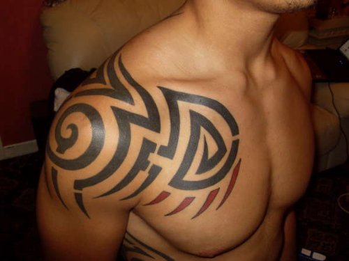 Tribal African Tattoo On Collarbone