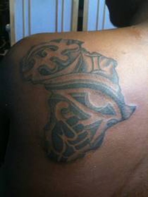 African Tattoo On Left Back Shoulder