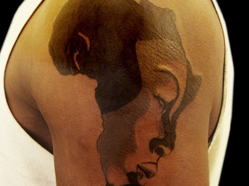 African Map and Queen Face Tattoo On Shoulder