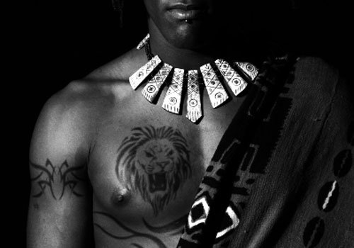 African Lion Tattoo On Guy Chest