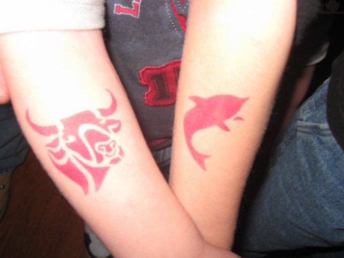 Bull And Fish Airbrush Tattoo On Arm