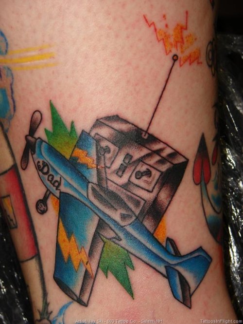 Blue Ink Airplane Tattoo On Sleeve
