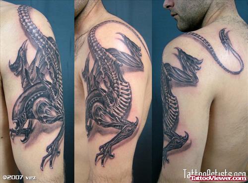 Grey Ink Alien Tattoo On Half Sleeve