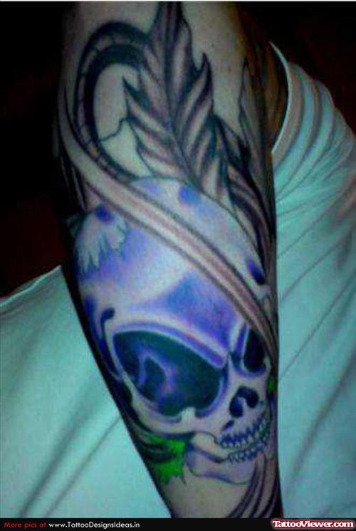 Blue Ink Alien Skull Tattoo On Arm