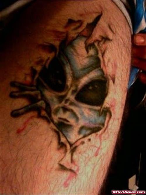 Ripped Skin Color Ink Alien Tattoo
