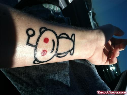Outline Alien Cartoon Tattoo On Left Arm
