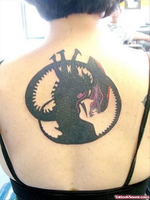 Black Ink Alien Tattoo On Girl Back