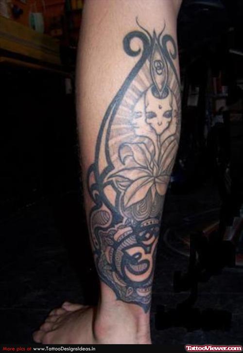 Flowers And Alien Head Tattoo On Arm
