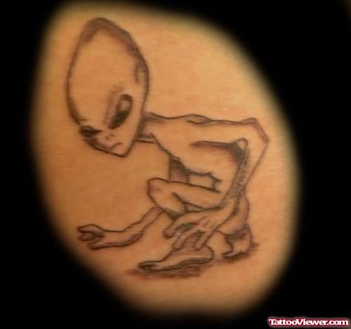 Grey Ink Outline Alien Tattoo