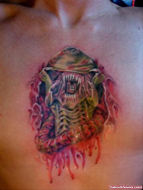 Colored Alien Tattoo On Man Chest