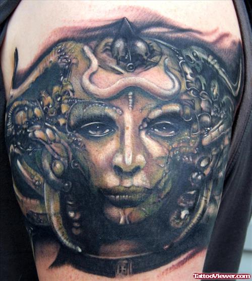 Female Alien Head Tattoo On Shoulder