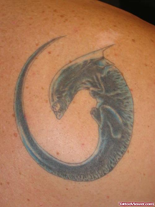 Colored Ink Alien Tattoo On Back