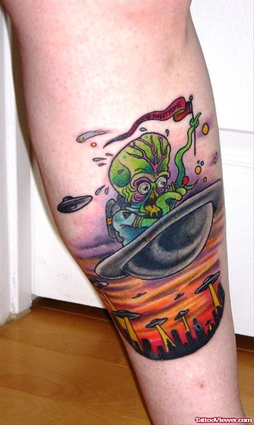 Alien Sitiing In Spaceship Color Ink Tattoo