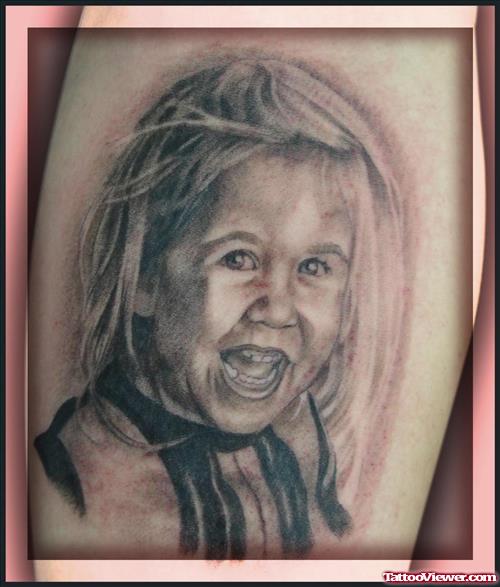 Alien Child Grey Ink Tattoo