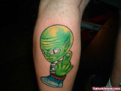 Cute Green Ink Small Alien Tattoo On Back Leg