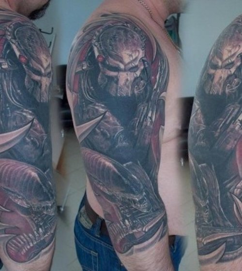 Half Sleeve Alien Tattoo