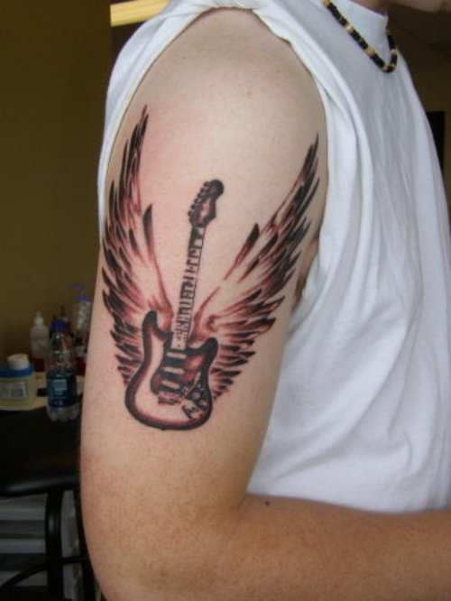 Guitar Alien Wings Tattoo
