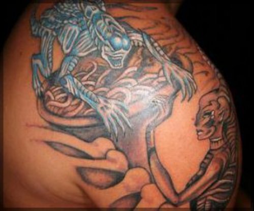Alien Tattoo On Back SHoulder