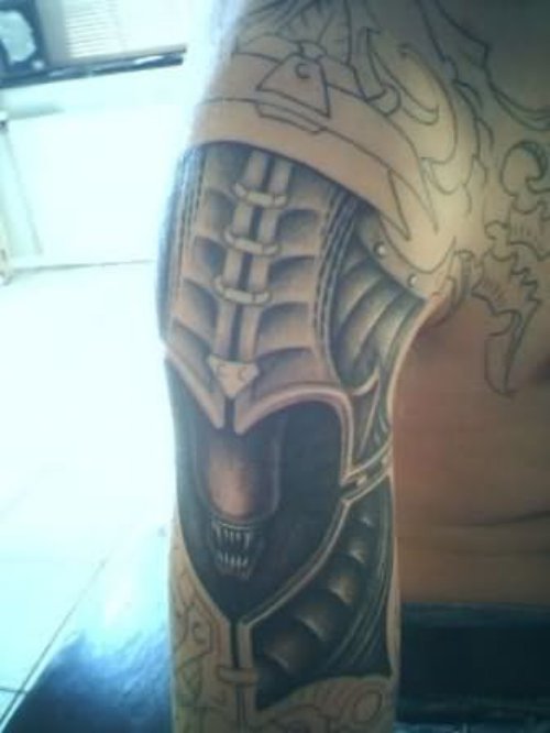 Scary Alien Tattoo Design On Bicep
