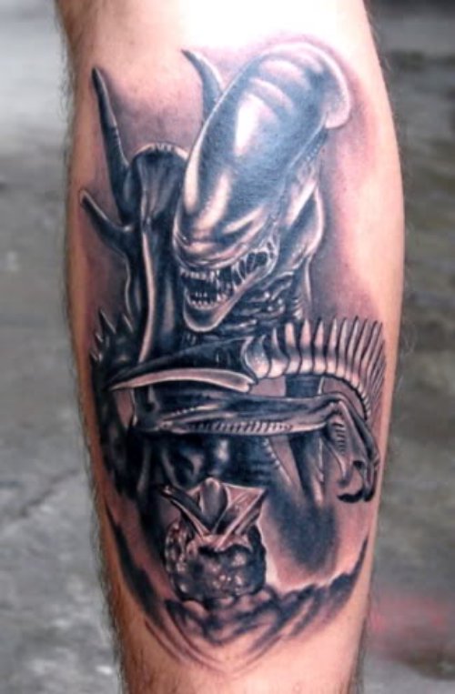 Classic Grey Ink Alien Tattoo On Back Leg