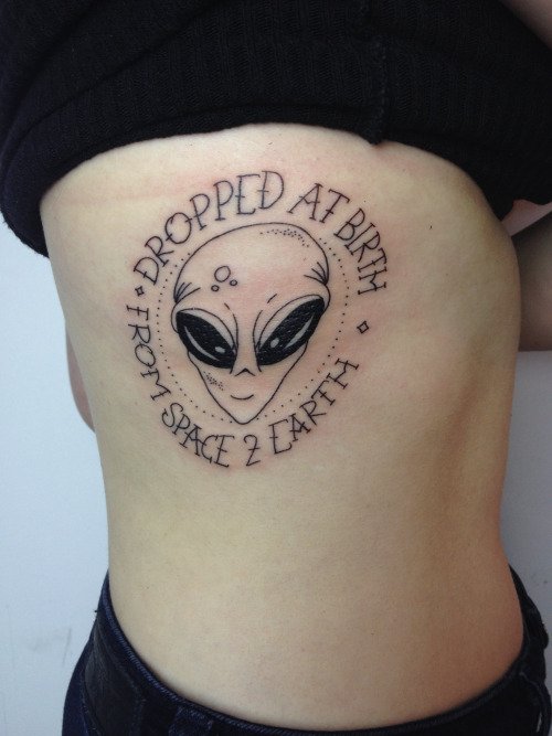 Dropped At Birth Alien Tattoo On Girl Side Rib
