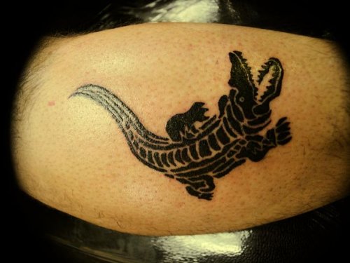 Black Ink Alligator Tattoo On Muscles