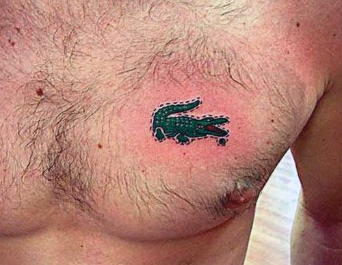 Green Ink Alligator Tattoo On Man Chest